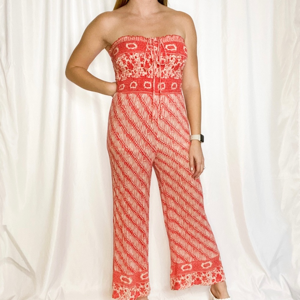 Free People orange printed smocked bodice jumpsuit, size small